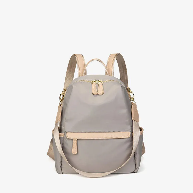 Elegant Lightweight Urban Chic Backpack with Gold-Tone Accents – Sleek Design with Contrast Zipper Details