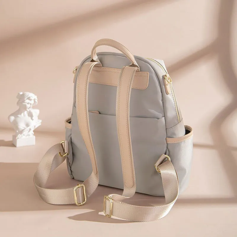 Elegant Lightweight Urban Chic Backpack with Gold-Tone Accents – Sleek Design with Contrast Zipper Details