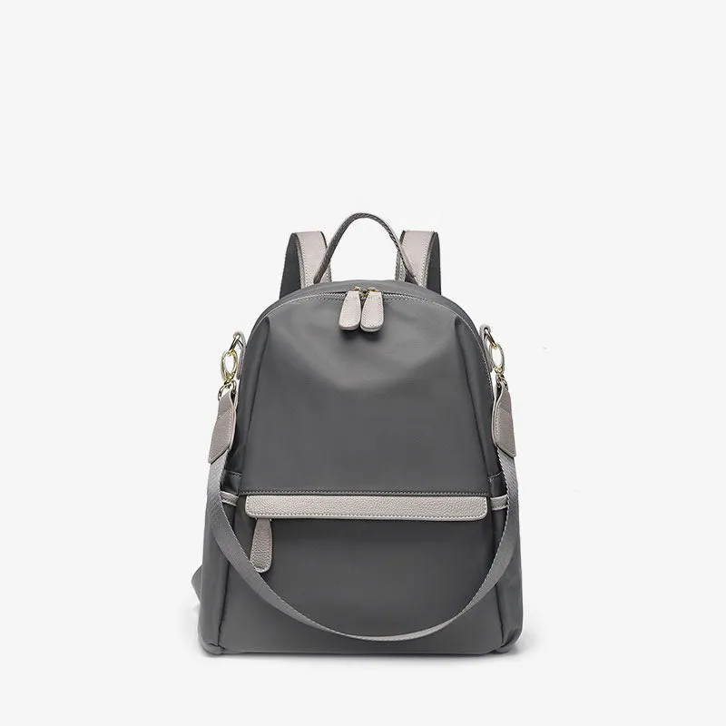 Elegant Lightweight Urban Chic Backpack with Gold-Tone Accents – Sleek Design with Contrast Zipper Details