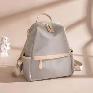 Elegant Lightweight Urban Chic Backpack with Gold-Tone Accents – Sleek Design with Contrast Zipper Details